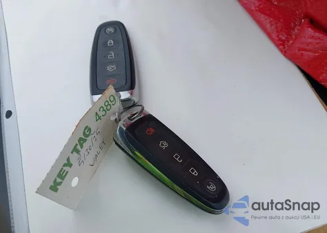 2014 Ford Escape Titanium z USA, uszkodzony, nr VIN 1FMCU9J99EUD98310